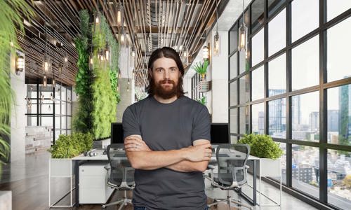 Atlassian Mike Cannon Brookes Standing In Office