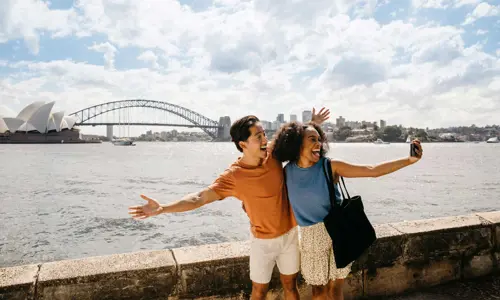 Couple taking a selfie at Sydney Harbour
