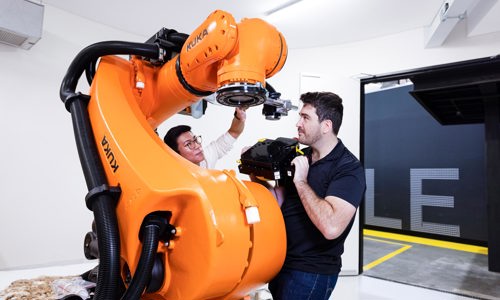 Researchers examining robot