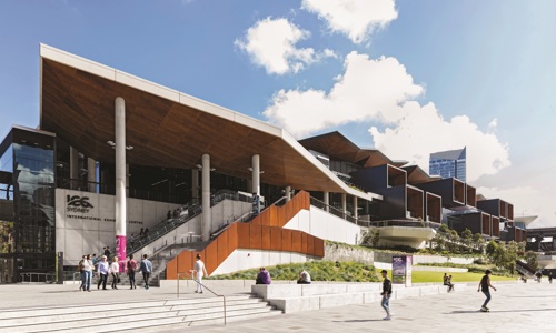 exterior of ICC Sydney architecture on sunny day with scattered visitors near the building