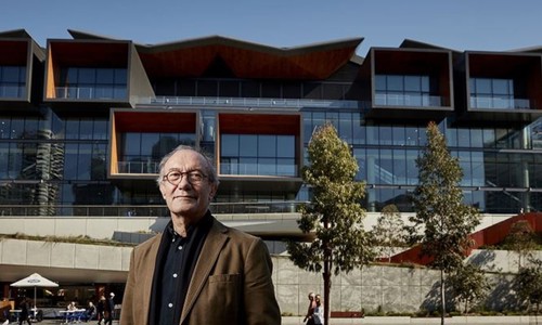 Professor Ken Maher Architect profile photo taken in front of ICC Sydney venue