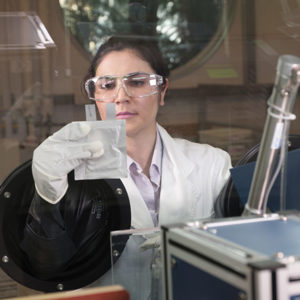 scientist observing lab test