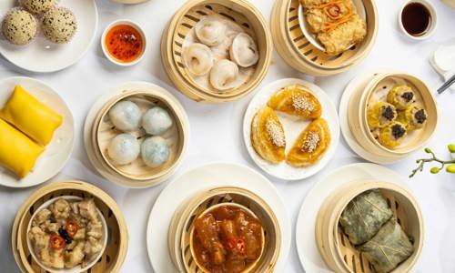 Flatlay photo of Yum Chat dishes at Royal Palace Seafood Restaurant